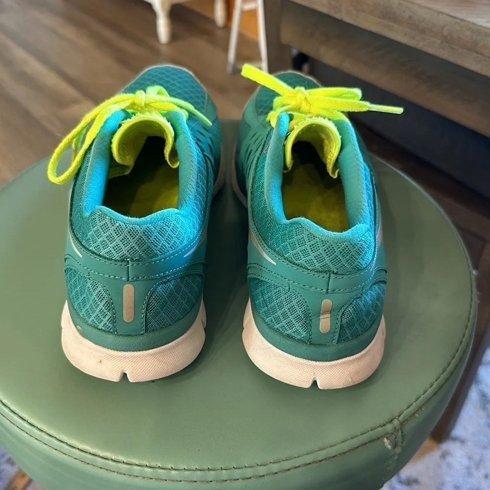 Nike running shoes, aqua blue, yellow, white size 9.5